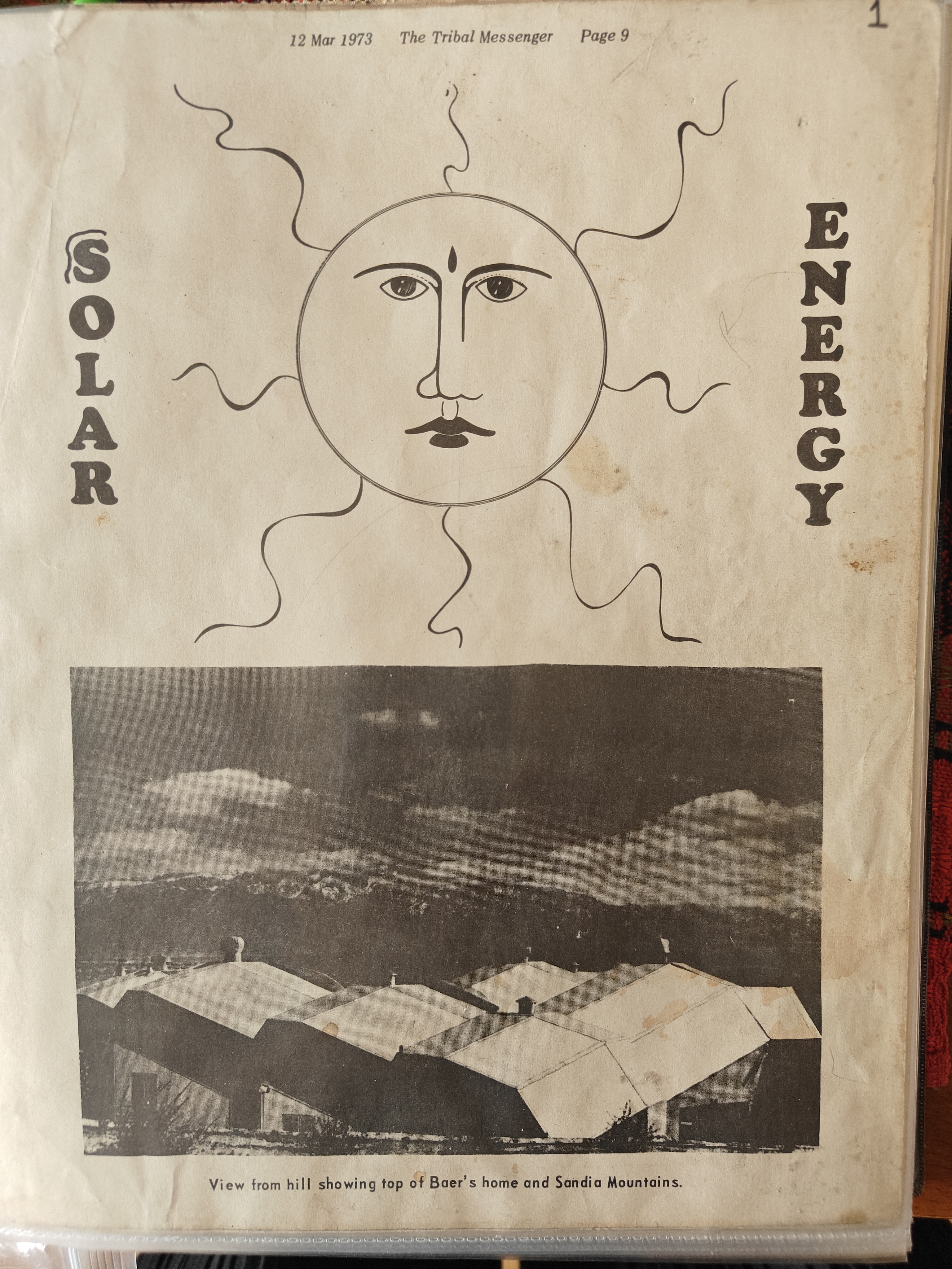 Cover of the Solar Energy insert in The Tribal Messenger, March 12 1973 — hand-drawn sun face above a photograph of the Baer house roofline and Sandia Mountains