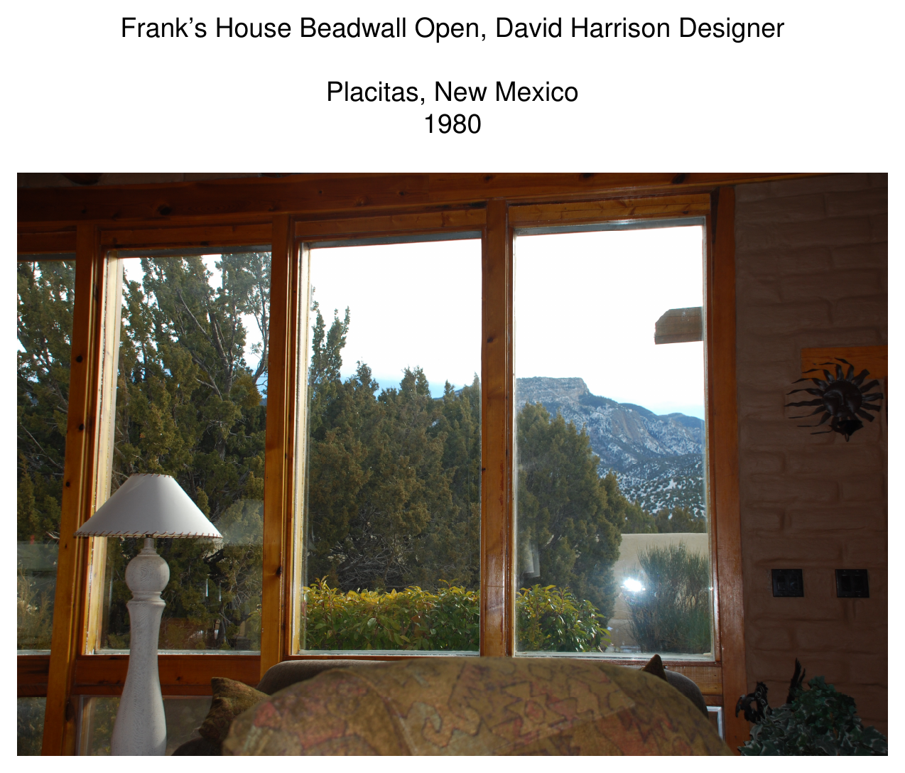 Interior photograph of Frank's House with Beadwall windows open, showing a table lamp and daylit room, Placitas, NM, 1980