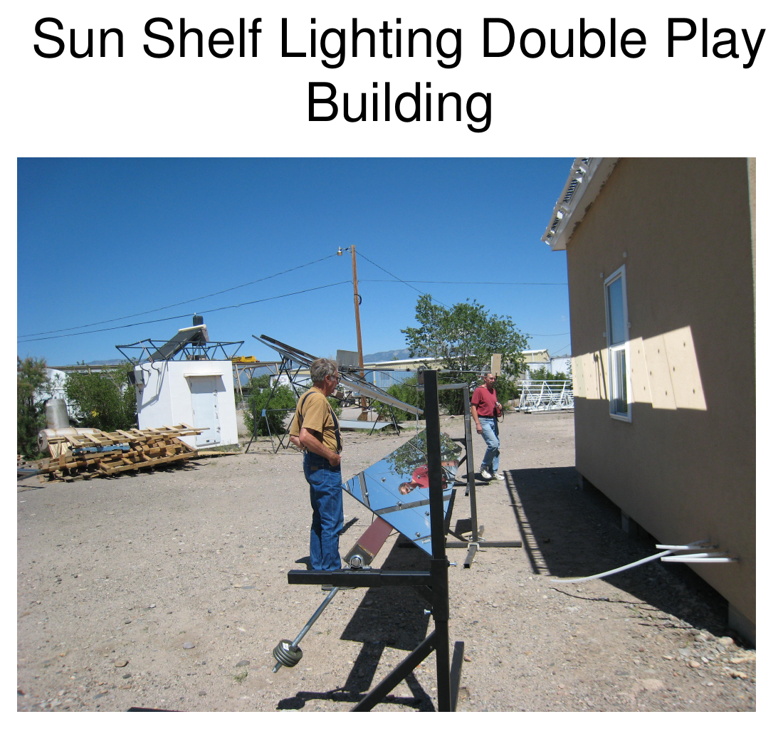 Exterior photograph of a worker installing Sun Shelf lighting on the Double Play building